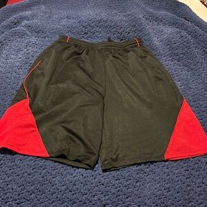 Men’s basketball shorts knee length.